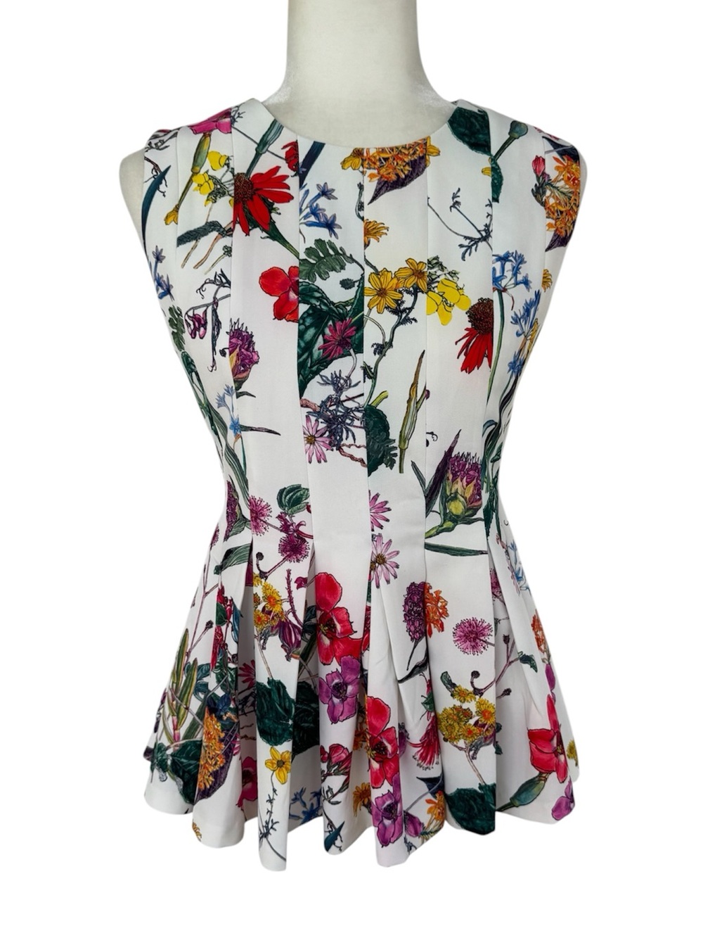 Gracia Floral Pleated White Sleeveless Peplum Top